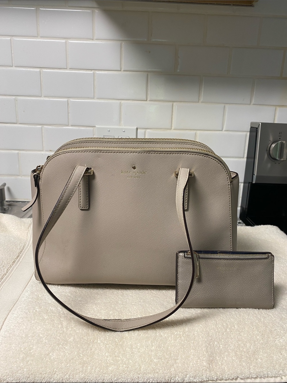 kate spade pebble leather dome satchel in taupe with matching wallet